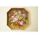 A 19th century Paris porcelain cantered square tray painted in coloured enamels with flowers on a