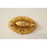 A Victorian gold brooch,