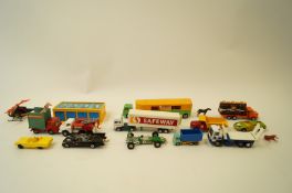 A collection of toy cars, including Matchbox,
