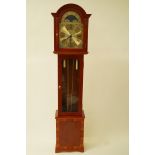 A 20th century longcase clock with yew wood case, enclosing a celestial moonphase,