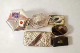 A German silver coloured box; a plated vesta case; a horn snuff box; a brass and enamel vesta;