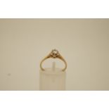 A diamond single stone 9 ct gold ring, the brilliant cut of approximately 0.