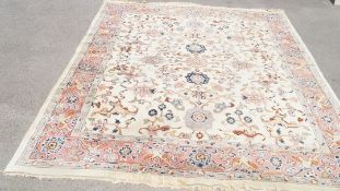 A woollen rug with stylised flowerheads on a cream field within one large band,