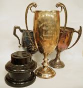 A silver two handled trophy cup, London 1920; with two other silver two handled trophy cups; 1,