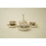 A Newhall porcelain tea bowl and saucer, a Spode bat painted tea cup and saucer,