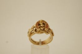 A large 9ct gold ring of equestrian interest,