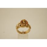 A large 9ct gold ring of equestrian interest,