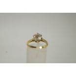 An 18ct gold single stone ring, 3.