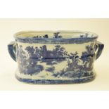 A late 20th century blue and white foot bath, 20cm high,