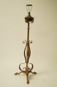 An Arts and Crafts style brass and copper oil lamp, converted to a standard lamp,