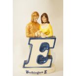 A Worthington 'E' advertising figure of a couple, 22.