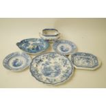 A Davenport pearlware shaped dish printed in blue with two chinoiserie figures,
