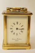 A brass framed carriage clock by Charles Frodsham London, striking on a bell, 18.