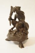 A pair of 19th century bronze figures of satyrs with snake handles, standing on cloven feet,