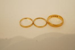 A 22ct gold wedding ring, another 7.2  g gross; and an 18 ct gold wedding ring, 1.