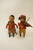 Two Shuco tin plate clock work figures of a monkey playing a violin, impressed marks,