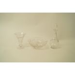 A glass decanter and stopper, with four horizontal cut bands, 31cm high,