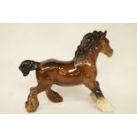 A Beswick bay shire horse, along with another dapple grey similar, each with black printed marks,