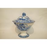 A 19th century pearlware egg stand, tureen and cover printed in blue with the Wild Rose pattern,