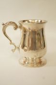 A silver mug, by Edward Barnard & Sons Ltd, London 1932,
