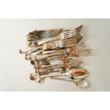 A collection of silver cutlery,