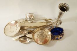 A small collection of silver flatware,