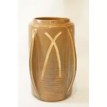 An Royal Doulton Art Deco vase by Florrie Jones, decorated in a brown glaze, four bow shape handles,