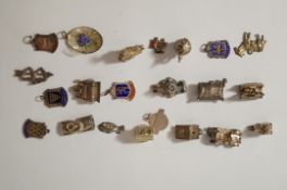 A collection of silver and silver coloured charms