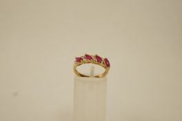 A ruby and diamond 9 ct gold dress ring,