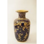 A Doulton vase printed in gilt with flowering branches, factory marks printed and impressed, 18.