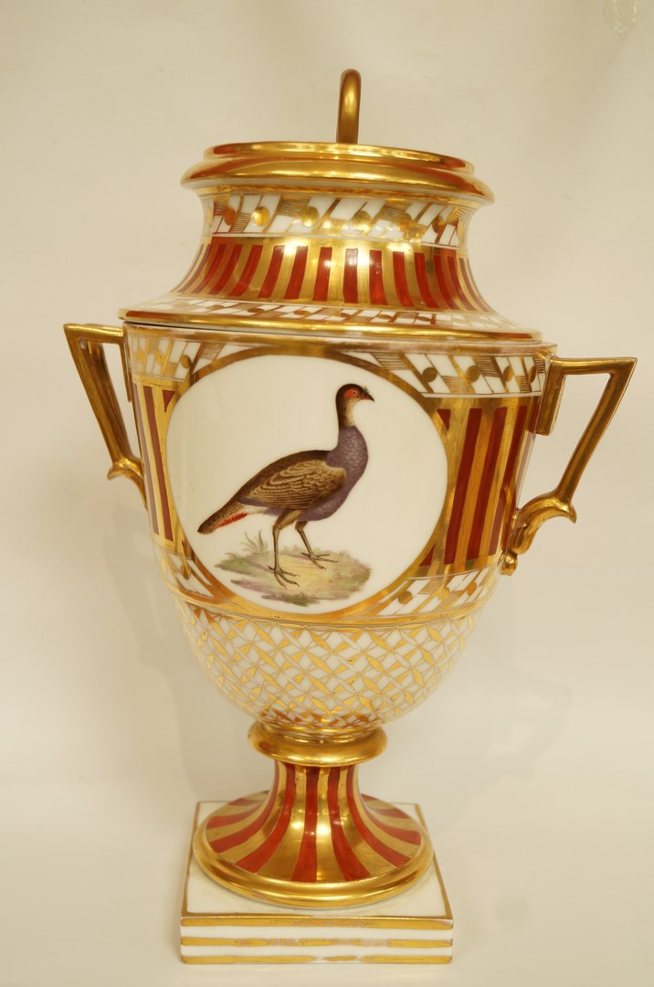 An early 19th century Paris porcelain two handled vase and cover,