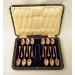 A cased set of twelve silver teaspoons and sugar tongs, by Cooper Brothers and Sons Ltd,