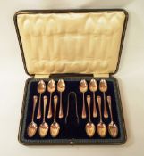 A cased set of twelve silver teaspoons and sugar tongs, by Cooper Brothers and Sons Ltd,