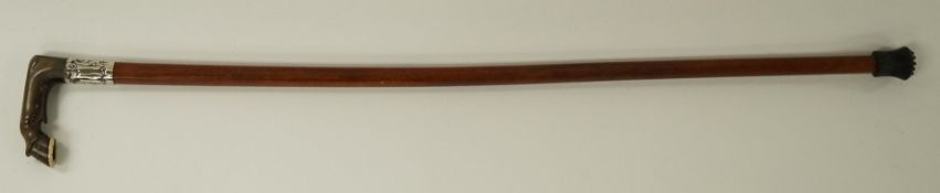 A malacca walking cane, with a horn handle carved as a horses fetlock and hoof,