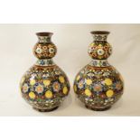 A pair of continental pottery vases, with incised slip decoration of flowers incised Pech,