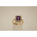 An amethyst and diamond 9 ct gold ring,