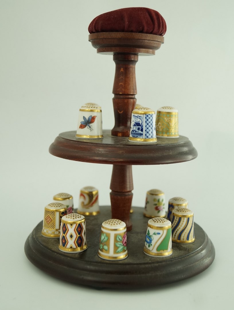 A set of fifteen Royal Crown bone china thimbles each decorated in coloured enamels and gilt, - Image 2 of 2