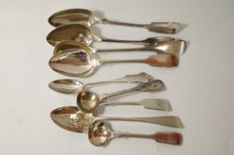 A collection of eight silver spoons including a Wells cathedral spoon;