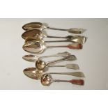 A collection of eight silver spoons including a Wells cathedral spoon;