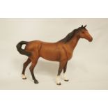 A Beswick brown horse, in matt glaze, printed marks in black,