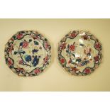 A pair of Chinese export plates each shaped and painted with flowers, 21.