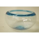 A Holme Gaard glass bowl with blue tinted rim, 26cm diameter,