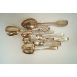 A small collection of silver spoons,