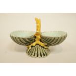A Victorian Wedgwood majolica salt in the form of sea shells linked by coral,