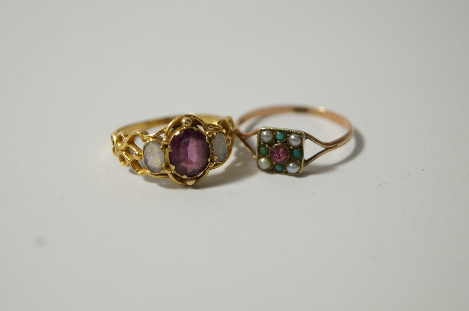 A garnet and opal dress ring; - Image 2 of 2