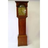 An oak longcase clock, the brass arched dial with later painted seascape, signed Johnson Dudley,