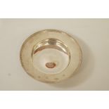 A small silver Armada dish, London 1979, 12 cm diameter,