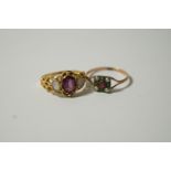 A garnet and opal dress ring;