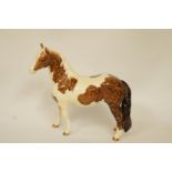 A Beswick figure of a pit pony, no. 1373, printed marks in black, 17.