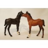 Two Beswick figures of foals both matt glazed, printed marks in black,